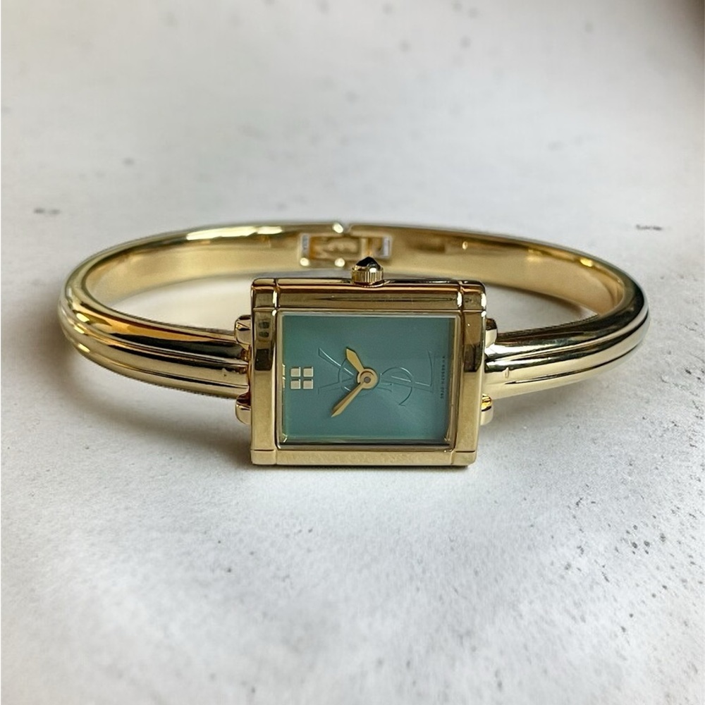 Yves Saint Laurent Gold Bangle Watch with Emerald Green Dial